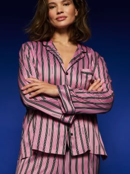 Woman wearing pink pajamas