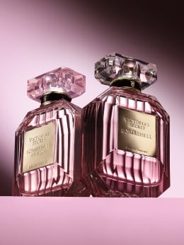 Pink perfume bottle with orchids